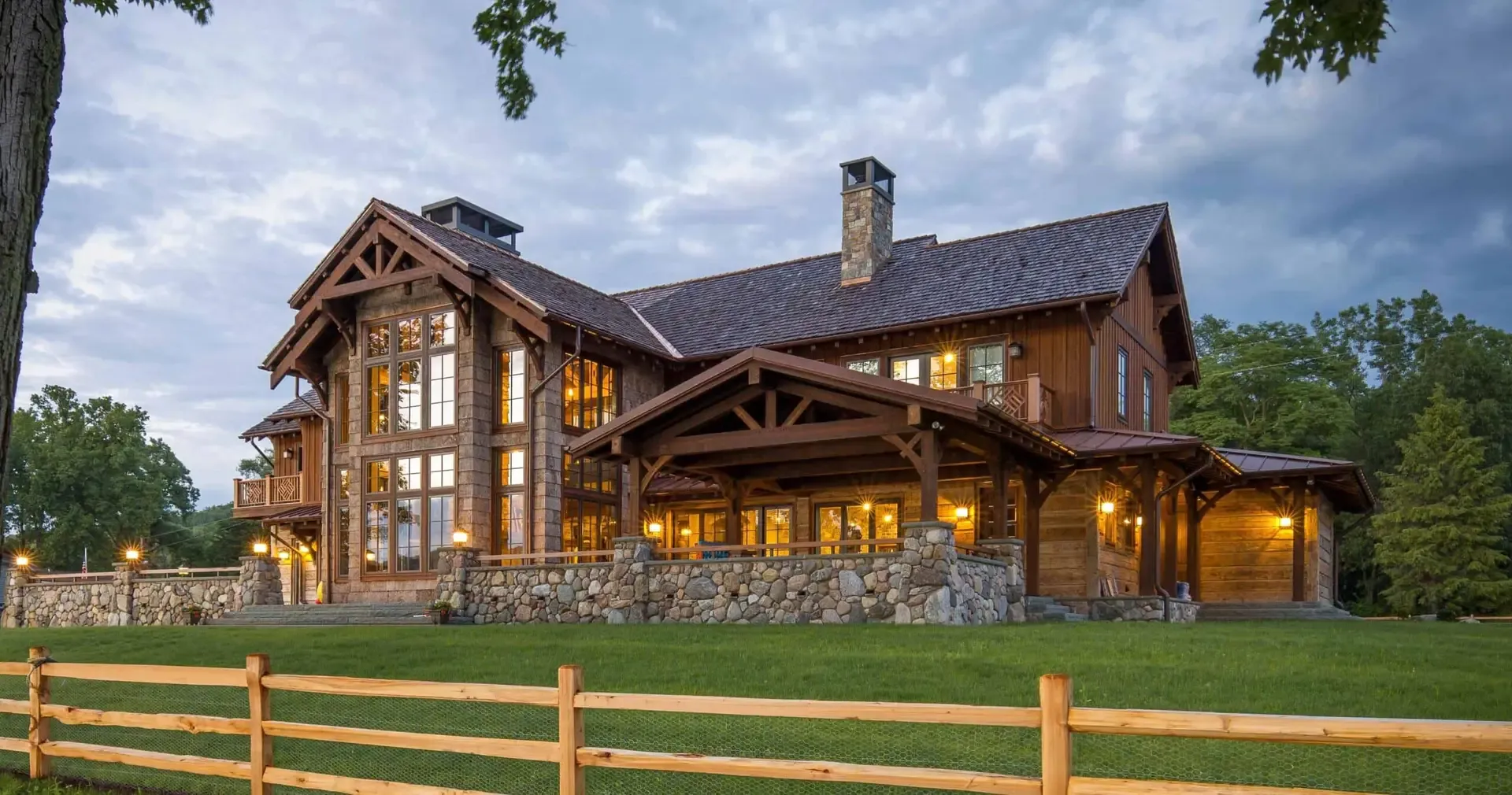 Timber frame home with stone chimney